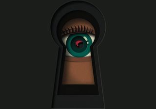 A green eye looking through a keyhole