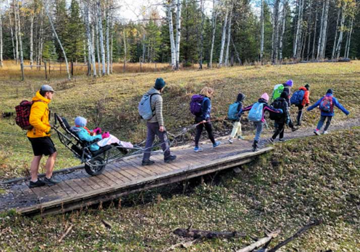 Hikers take the HPED TrailRider for its first excursion on Oct. 2